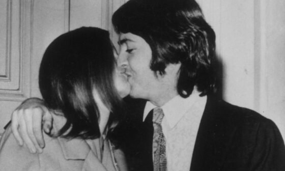 A gray morning, a quiet vow On a gray London morning in 1969, as headlines swirled with speculation about the future of The Beatles, Paul McCartney chose a different story. Hand in hand with Linda Eastman, he walked not into an arena or studio, but toward a modest registry office. There were no dazzling lights, no stadium cheers — just the hush of rain-soaked streets and the certainty of two people choosing love over spectacle. For McCartney, the decision was as bold as any chord he’d ever struck: a step away from the frenzy of Beatlemania, into something far more personal. 1969, Paul McCartney married Linda Eastman at Marylebone Register Office. They then held a reception lunch at The Ritz Hotel, Paul then went to Abbey Road studios in the evening to work. A ceremony shielded by love Inside, the atmosphere was stripped of grandeur. A handful of close friends and family pressed close, forming a protective circle around the couple as if guarding a secret. There were no sweeping gowns or gilded carriages, only the quiet solemnity of vows spoken from the heart. Outside, in the drizzle, fans gathered in throngs, some sobbing, some cheering, their voices carrying through the damp air. The rain could not dampen their devotion; when the doors finally opened, it seemed the entire street exhaled at once. The Day Paul McCartney Married Linda Eastman A love story steps into view The turbulent years of Paul and Linda McCartney: Why the perfect marriage of pop was never so | Culture | EL PAÍS English The newlyweds appeared, hand in hand, Linda radiant in her simplicity, clutching a modest bouquet, Paul smiling with a tenderness that even the sharpest camera lens could barely capture. His boyish grin softened by the weight of fame, her quiet glow undimmed by the flashing bulbs — together they looked less like rock ’n’ roll royalty and more like two people in love, carving out a space for themselves in a world that demanded constant spectacle. Whispers spread among onlookers that this was no ordinary marriage; it was the beginning of a different kind of revolution, one not broadcast on record players but written in the private language of devotion. A revolution of the heart 12 March 1969: Paul McCartney marries Linda Eastman | The Beatles Bible When they drove away in an ordinary car, leaving the umbrellas and flashbulbs behind, the moment became history. It was proof that love, in its most unguarded form, can outshine the noise of an era. For fans, it was bittersweet — the end of one chapter in the Beatles’ myth and the beginning of another story, quieter but no less powerful. For Paul and Linda, it was the start of a partnership that would stand as a testament to resilience and tenderness. On that gray London morning, the world witnessed not just a wedding, but the opening chords of a love story destined to endure far longer than gossip ever could. paul-and-linda